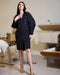 Robe Éclipse Ousman O. en jacquard noir et argenté, motifs géométriques, manches longues et fermeture à strass, pièce de créateur rare disponible prochainement en ligne en édition limitée à 6 pièces.
